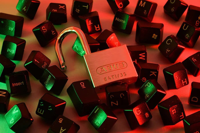 An open padlock on a keyboard